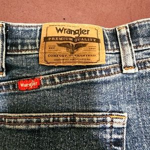 Wrangler size 42x30 blue regular fit stretch waist jeans. Faded Used good